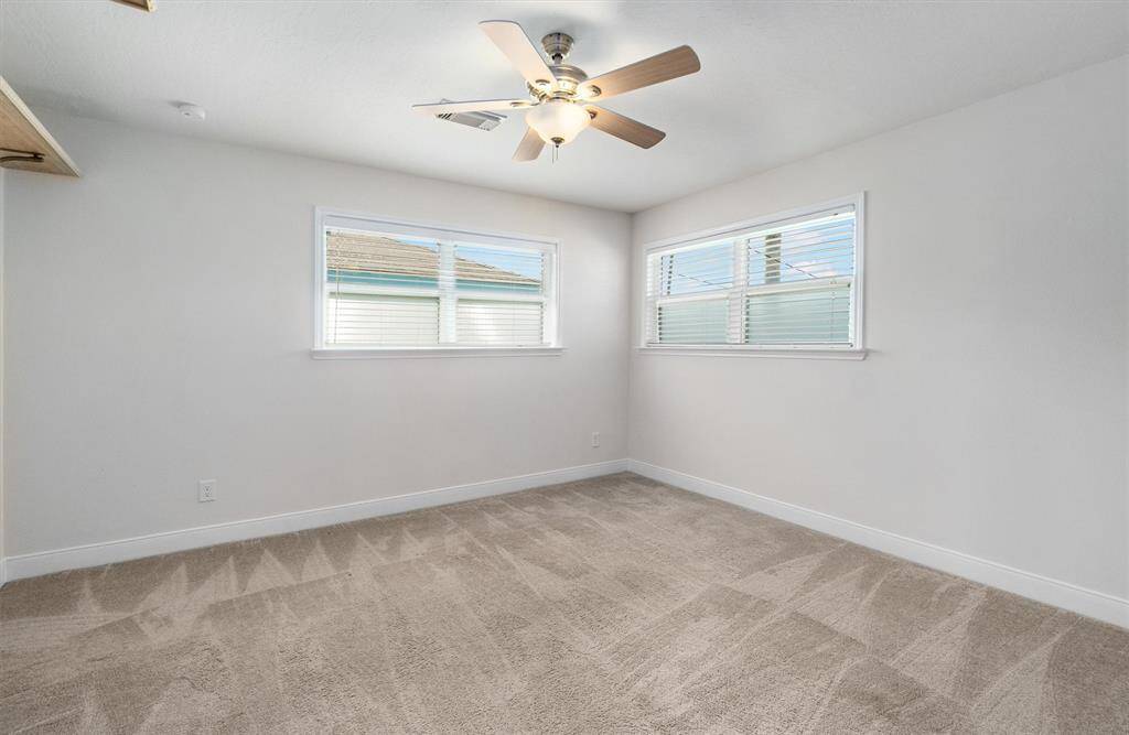 The guest bedroom also has natural lighting