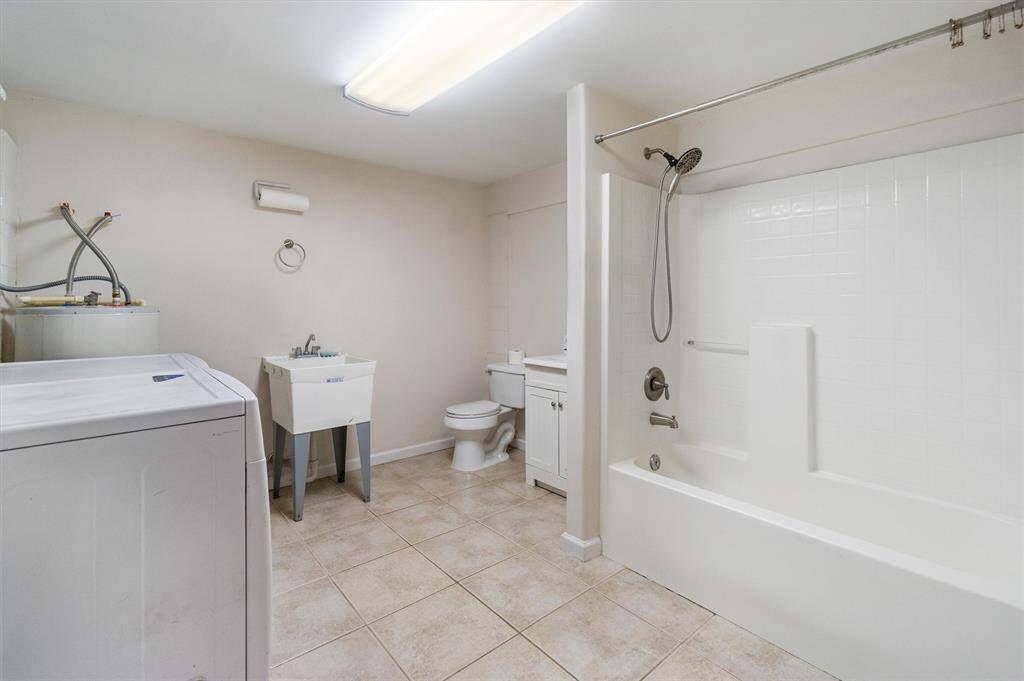 A full bathroom and laundry are downstairs