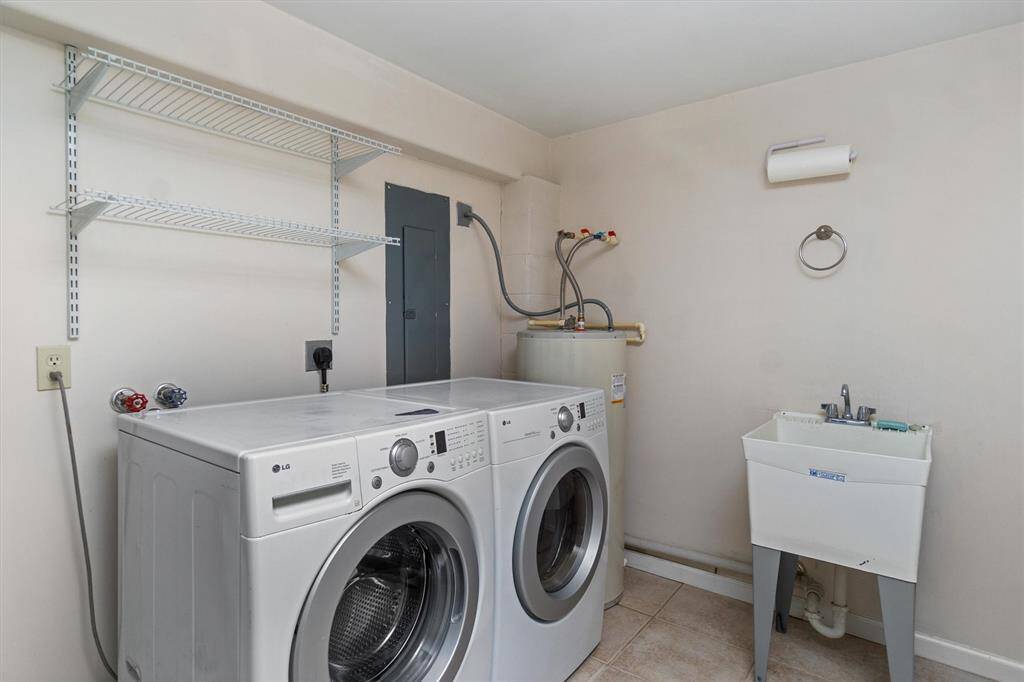 The laundry room is spacious and there's a work sink downstairs which will be great to use after cleaning your fish