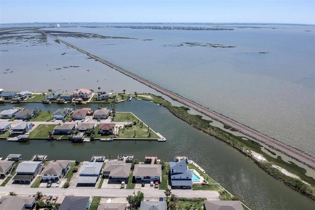 Jones Lake towards Galveston Bay or the ICW. The railroad bridge is your boating exit
