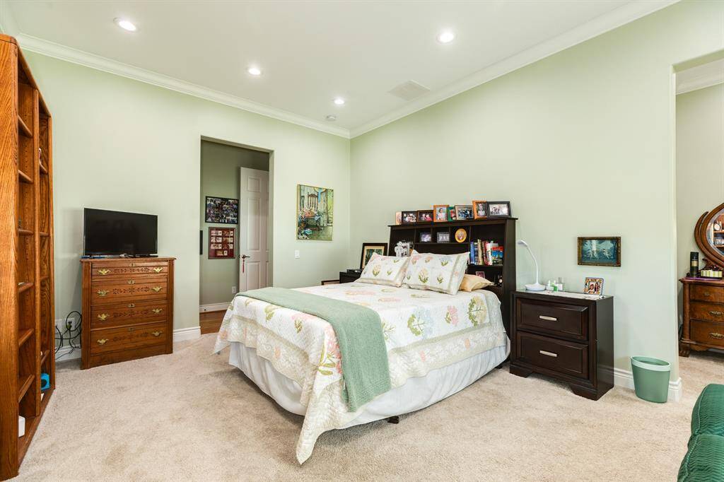 Spacious primary bedroom located downstairs.