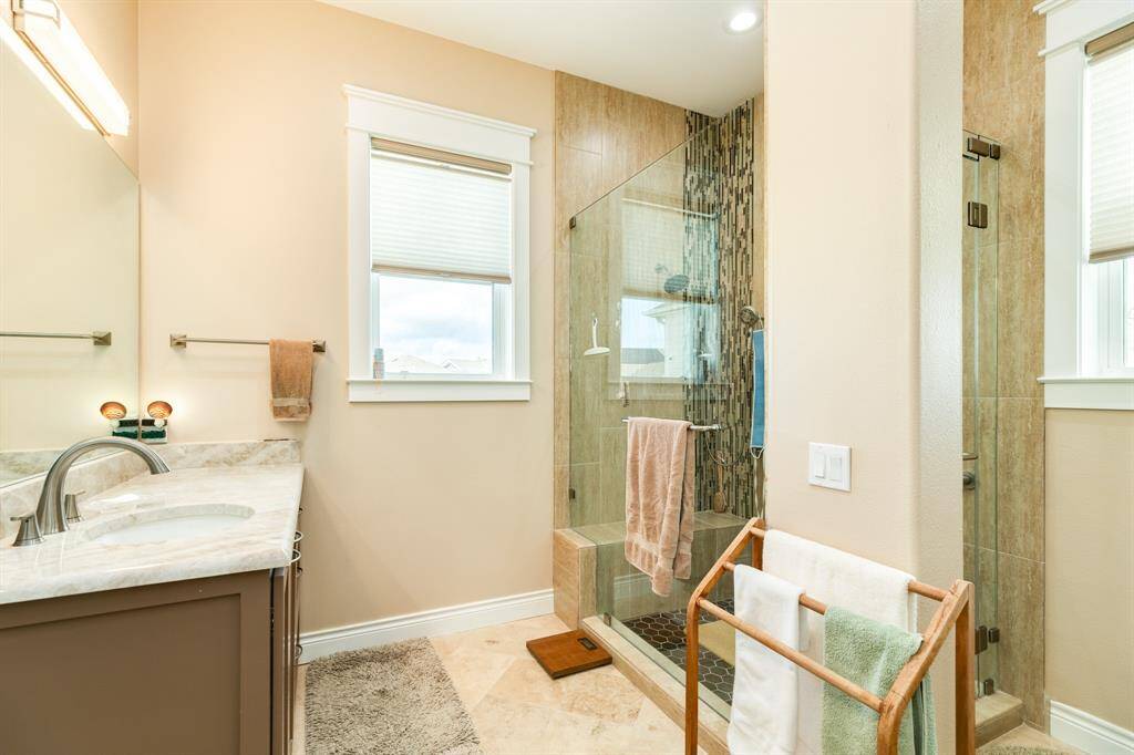 Ensuite bath with walk-in shower.