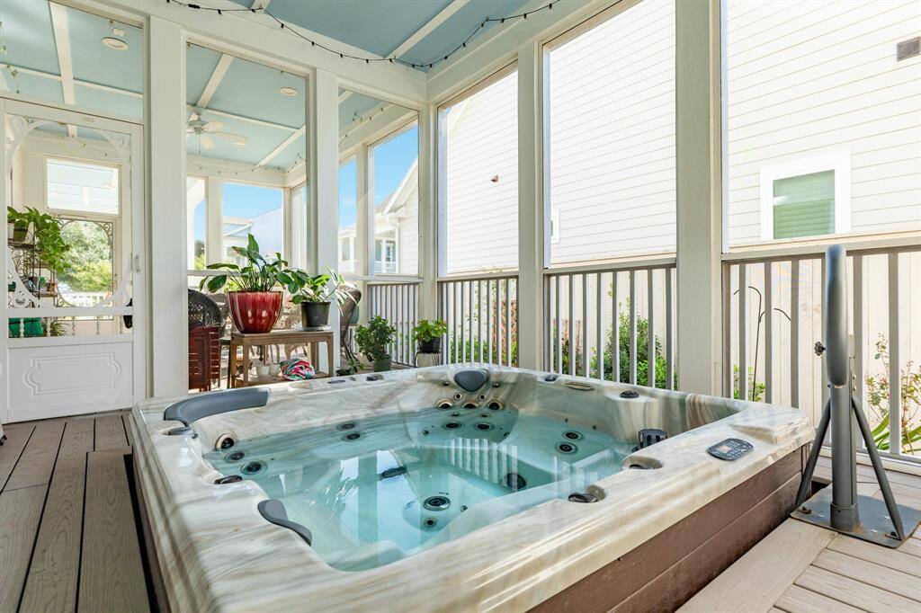 Screened in 6-seat hot tub.