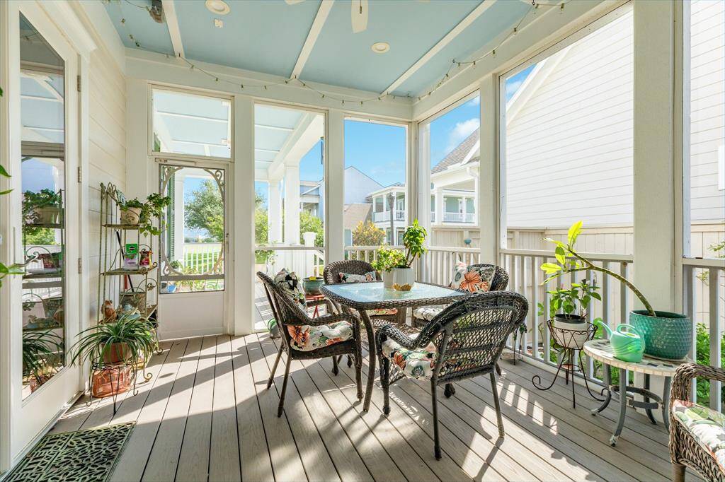 Bright and airy screened in porch.