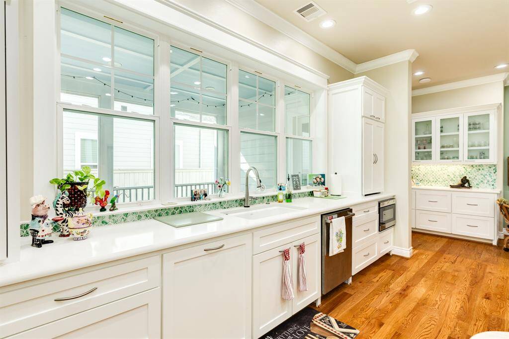 Large windows provide ample natural lighting.