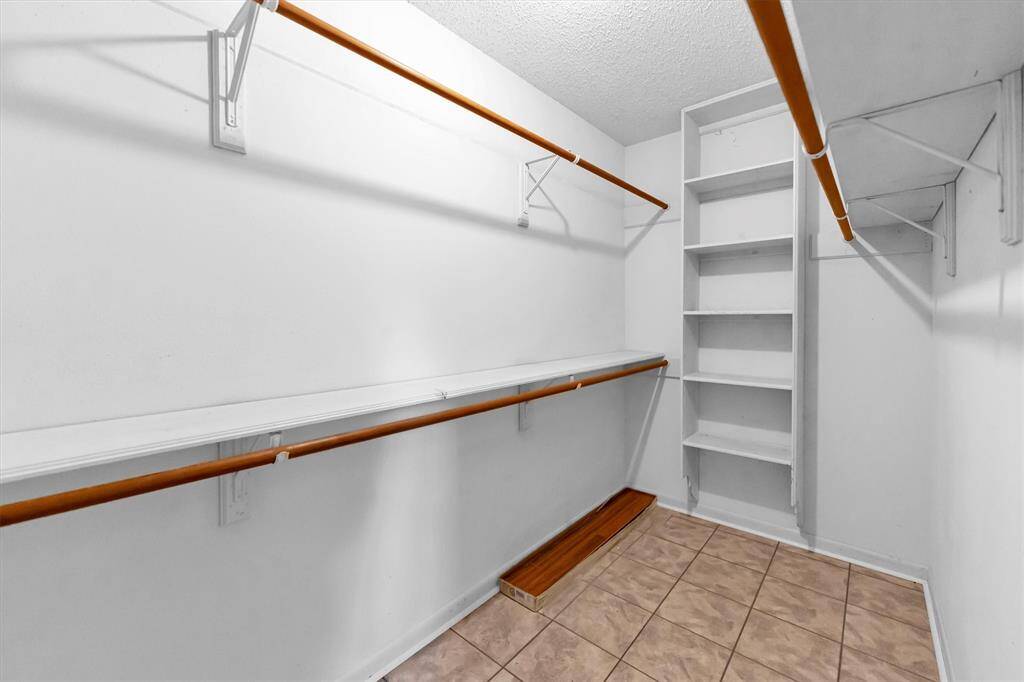 Primary bedroom walkin closet