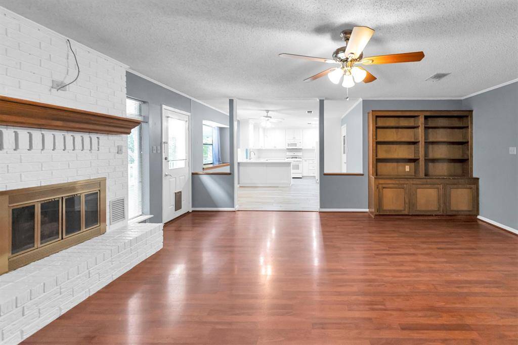 Living room leads to the dining room and kitchen