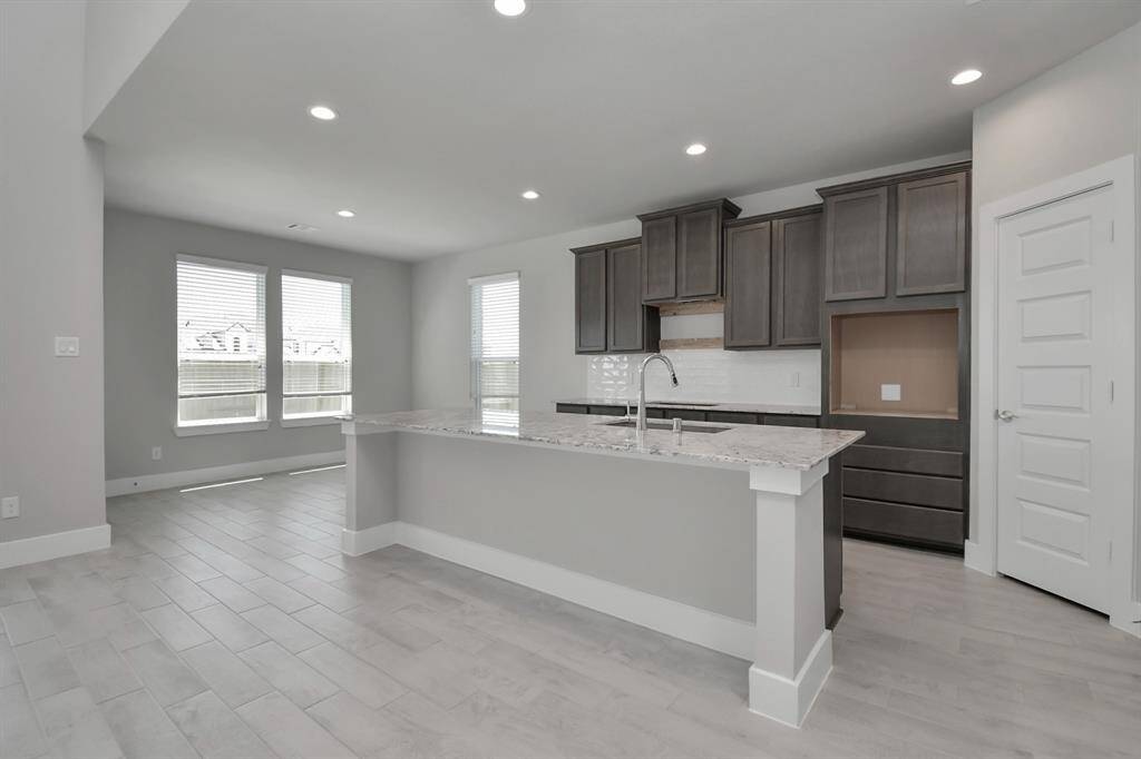 Sample photo of completed home with similar floor plan. Actual colors and selections may vary.