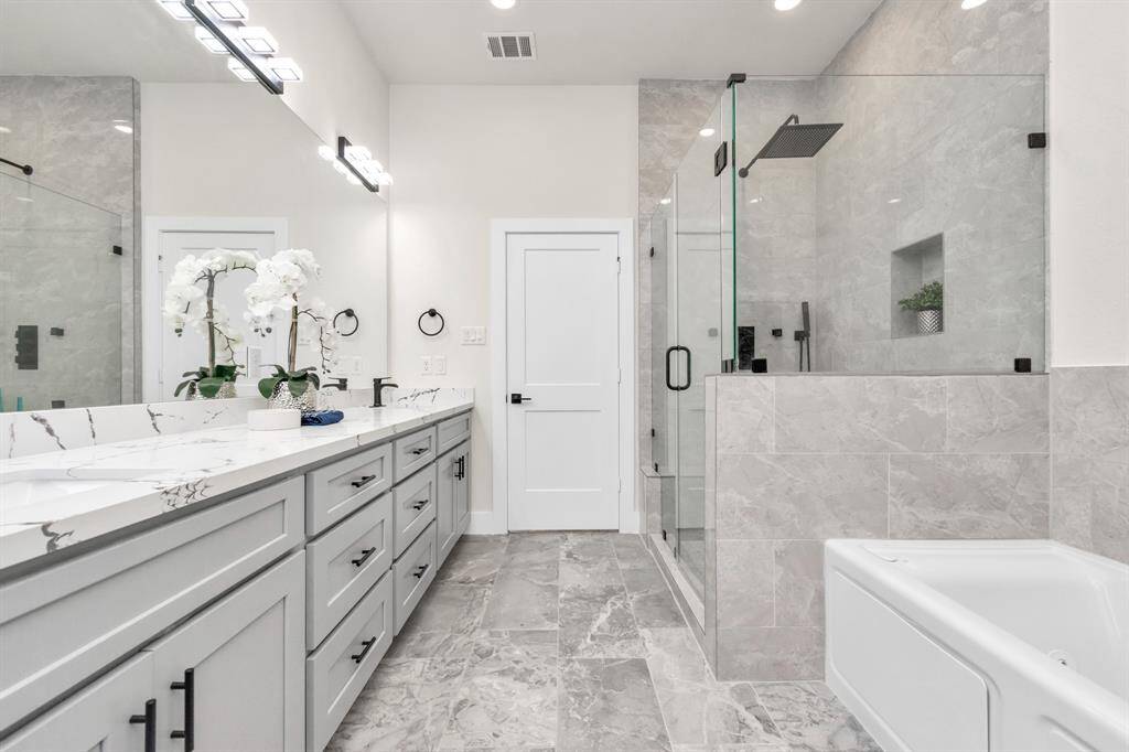 Master bathroom with tons of storage space.