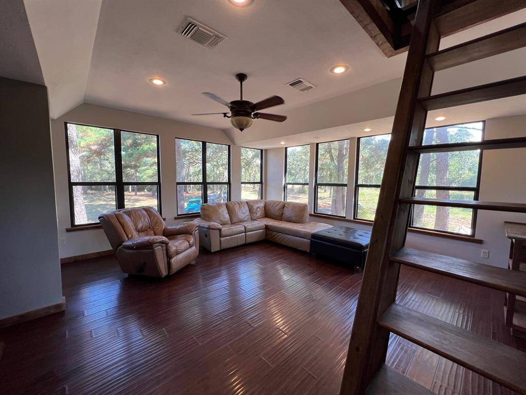 Living Room on 2nd level with door to upper patio