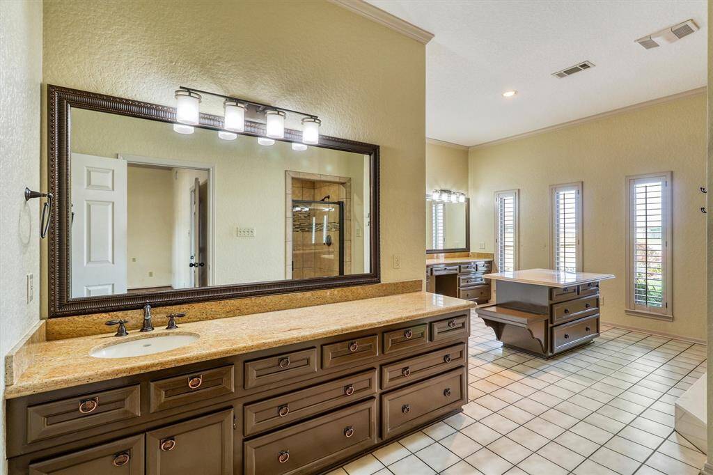 Primary Bathroom is very spacious. His and her vanities.