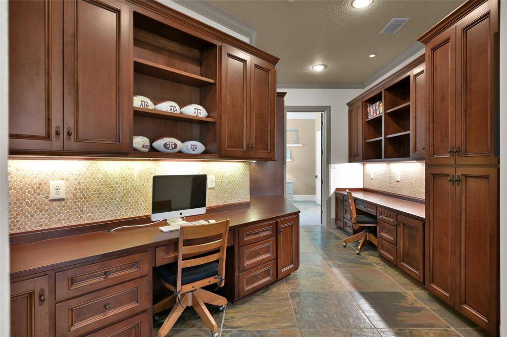 Custom built in workstations between two of the secondary bedrooms.
