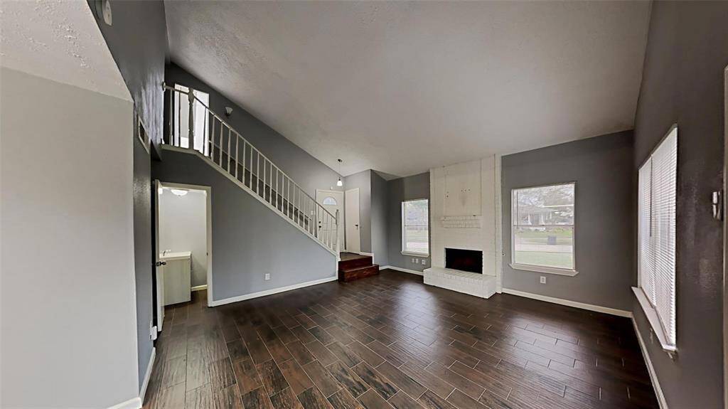 Envision having memorable family moments in this great living room, a highlight of this two-story home with the added convenience of a downstairs half-bathroom for guests.