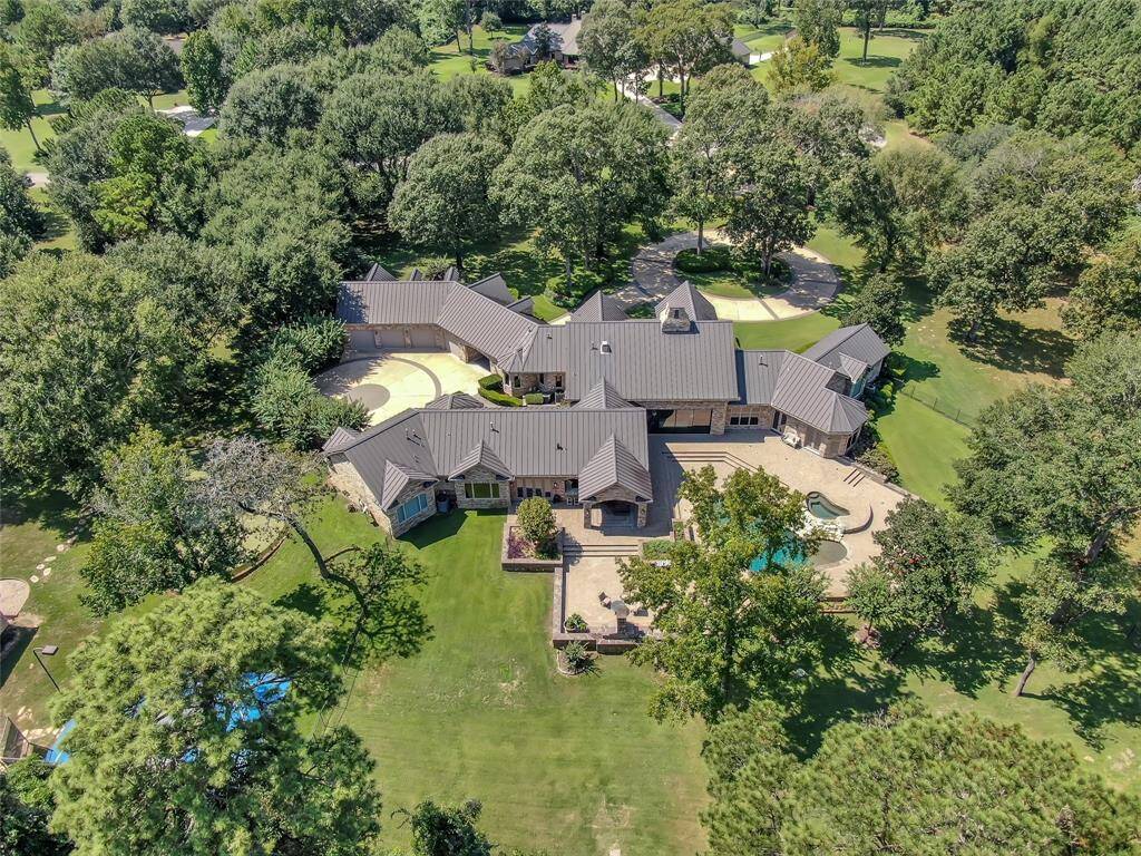 Aerial view of the rear of the home, showcasing the generous outdoor space!