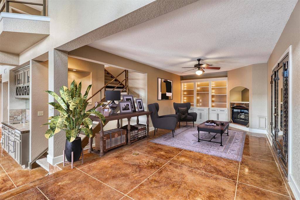 Cozy up by the fireplace and enjoy your favorite book. Built-in shelves to show off all of your decorations.