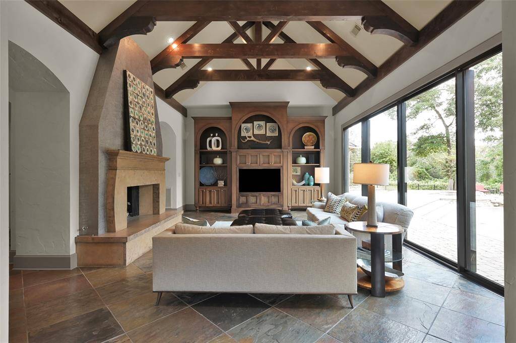 Family room showcasing a stunning view of the large fireplace.