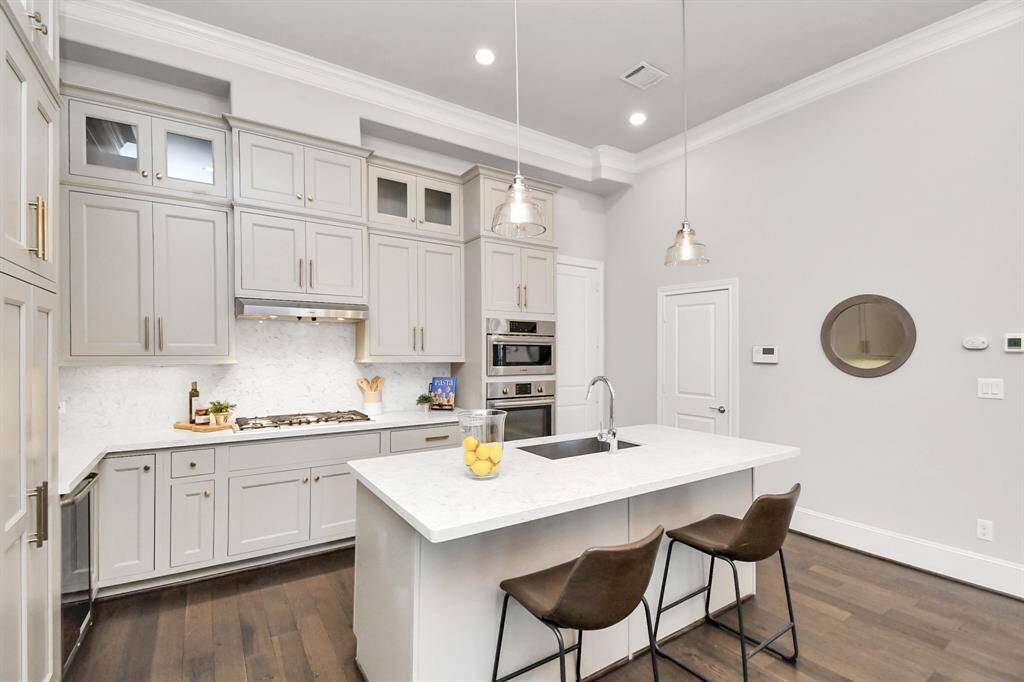 Next to the pantry you will find the much needed wine fridge!