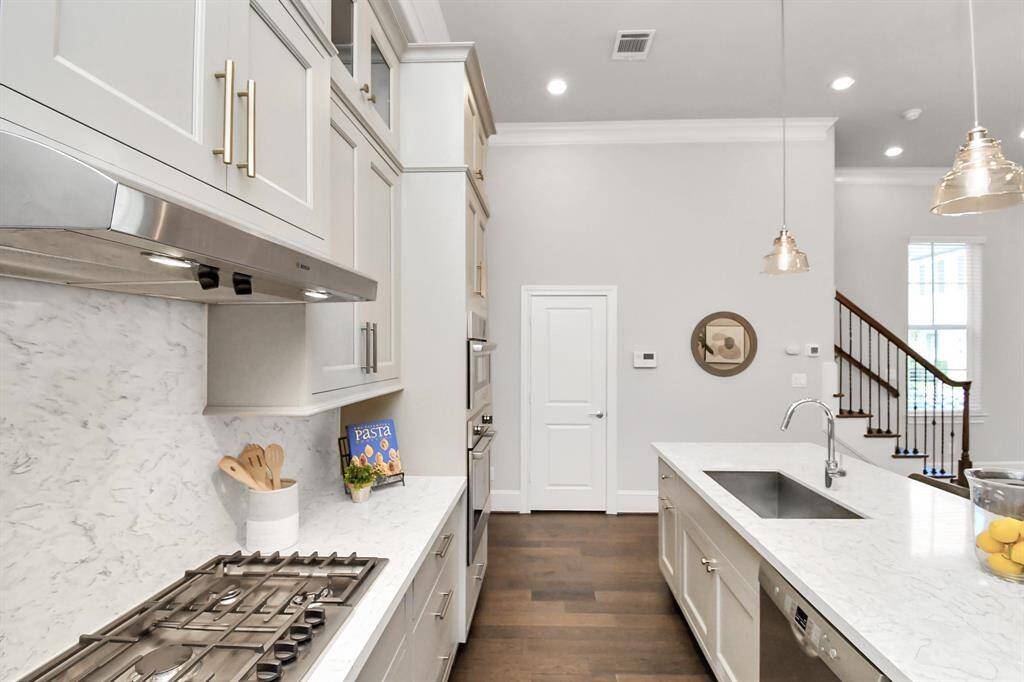 The second row of soft-closing cabinets is a nice upgrade.