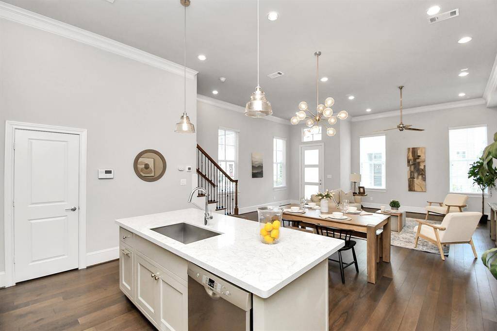 The layout of this 3-story home with first-floor living is a rare diamond to find in this community.