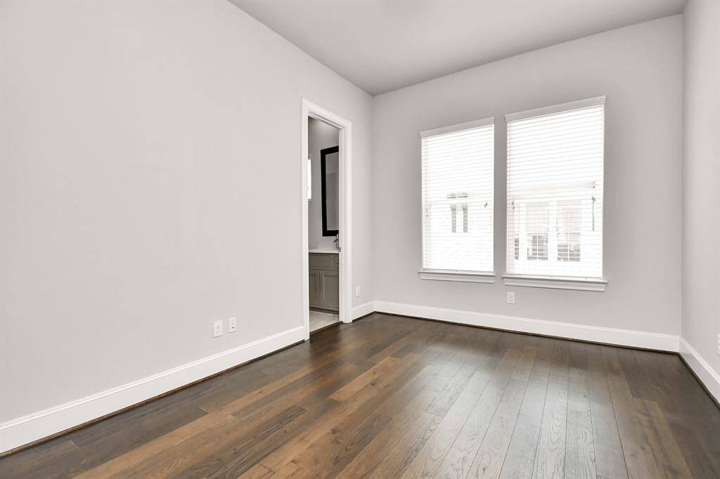 Secondary bedroom on second floor. This bedroom is spacious (11x14) with an en-suite bathroom and closet.