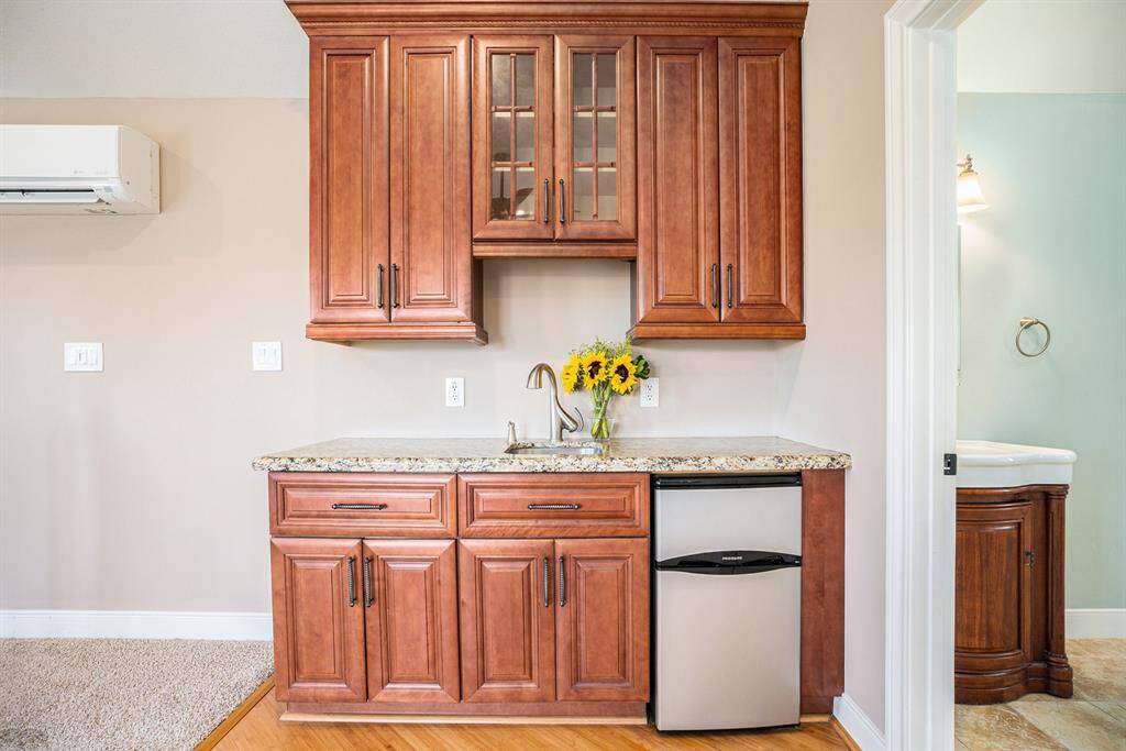Guest suite kitchen with mini fridge and sink