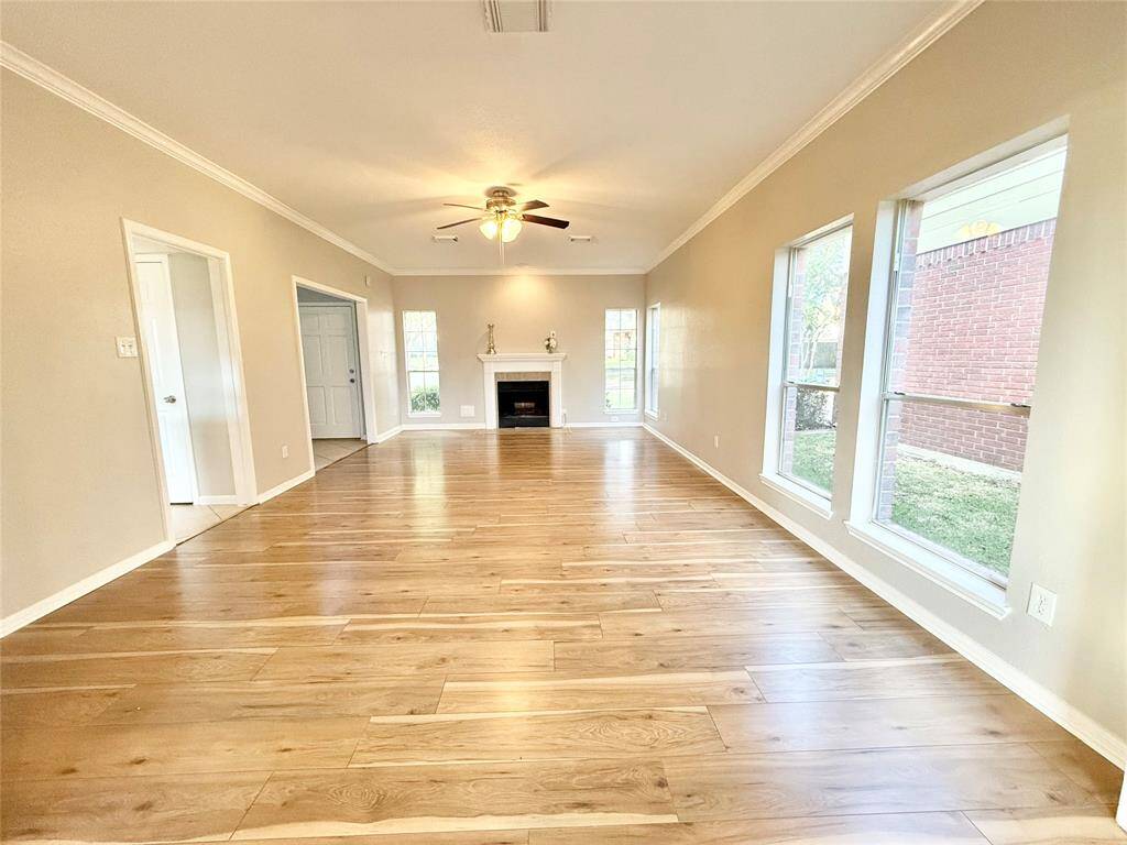 Lots of natural light. This is standing in the dining room looking into the huge living area.