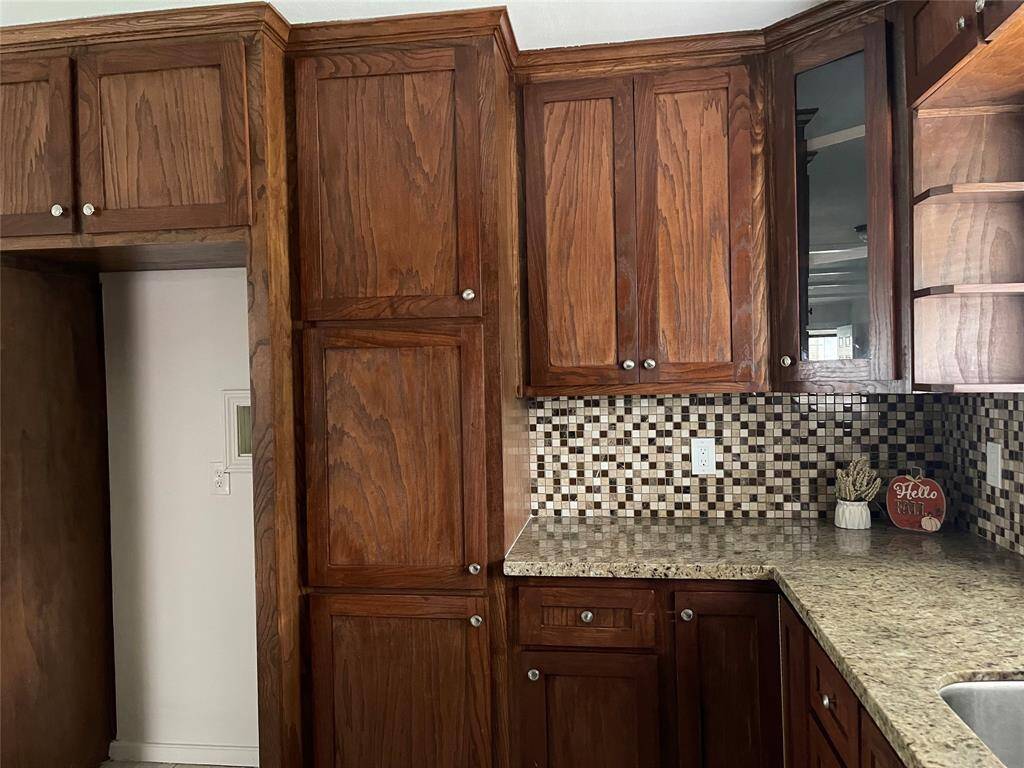Kitchen is very spacious and looks into the dinning area and living room