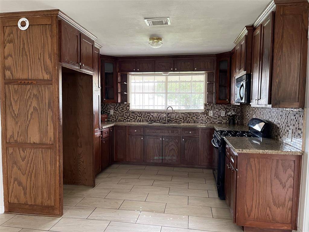 Kitchen with granite countertops