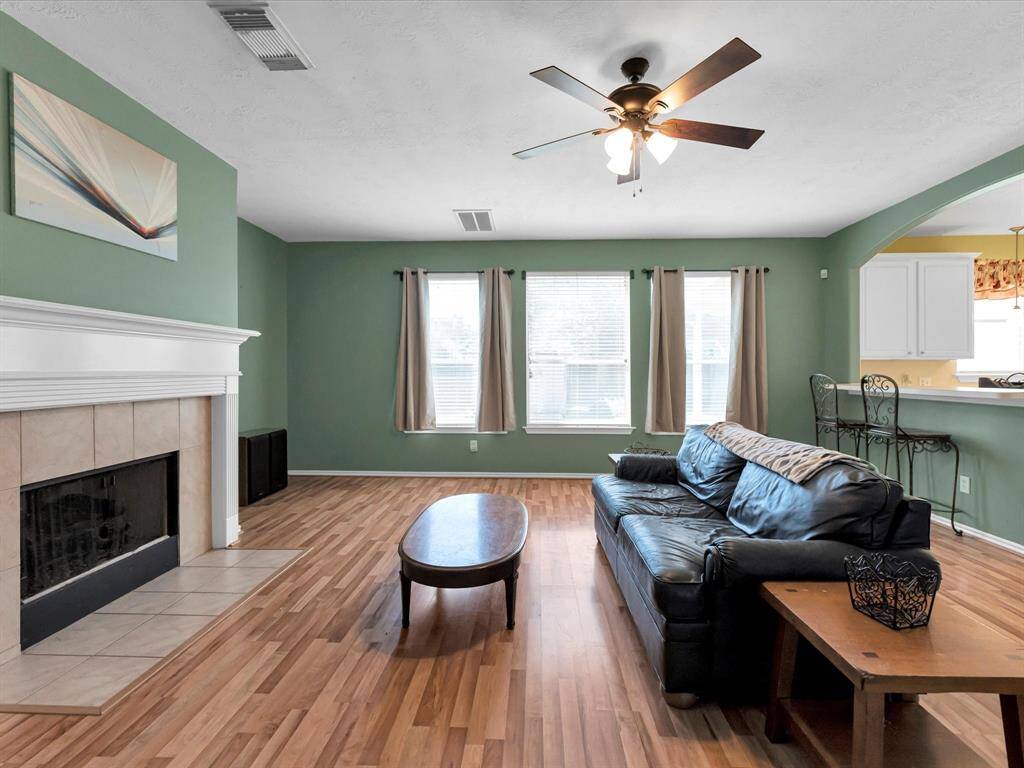 Another view of the family room shows that it opens to the kitchen bringing everyone together.