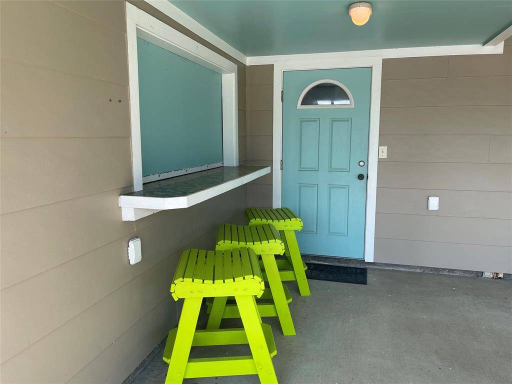 Welcome to your private lower-level entrance, featuring a cheerful colors and a kitchen