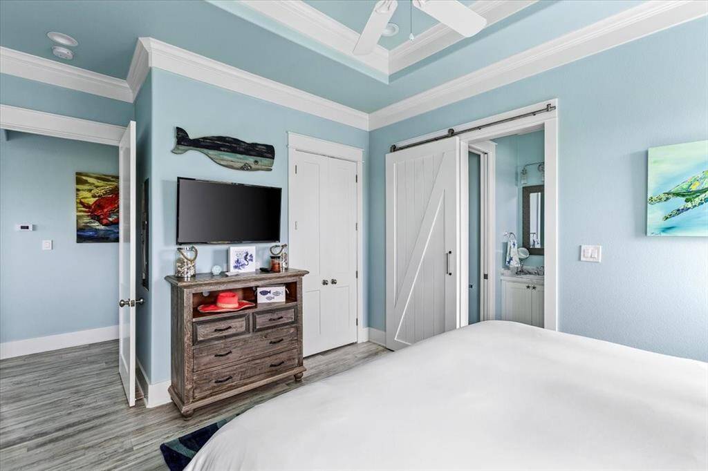Primary bedroom with en-suite bath and spacious closet.