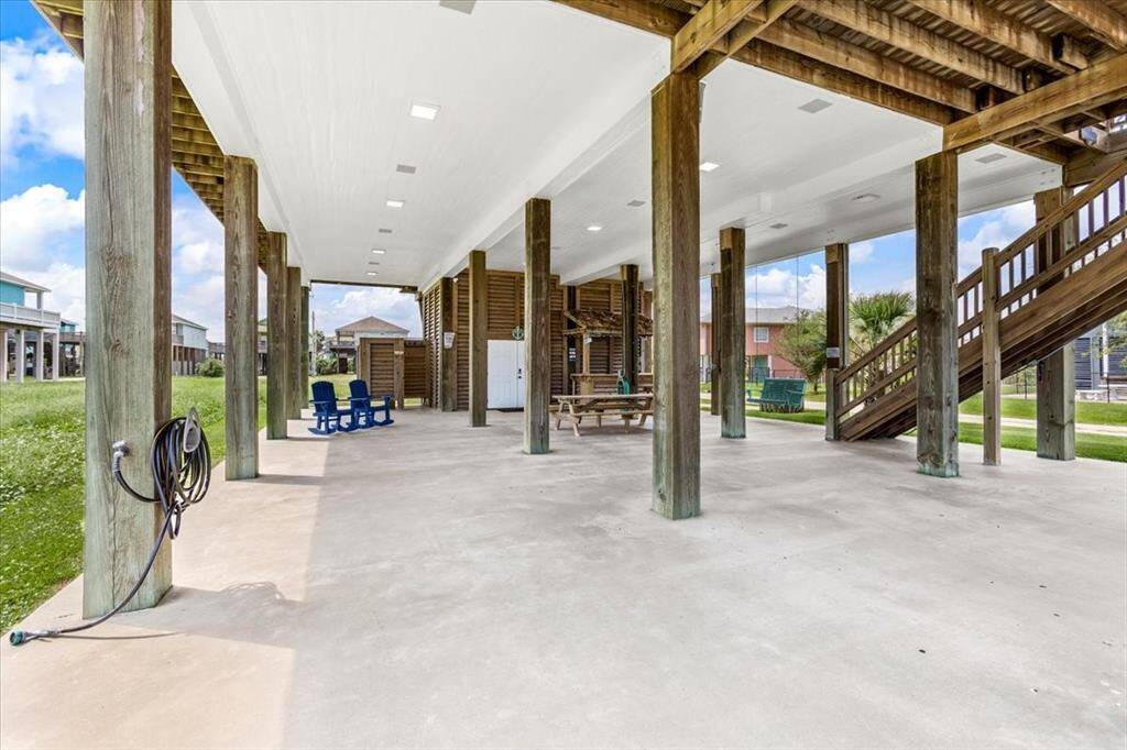 Spacious outdoor area downstairs perfect for hosting guests and enjoying your beach home.