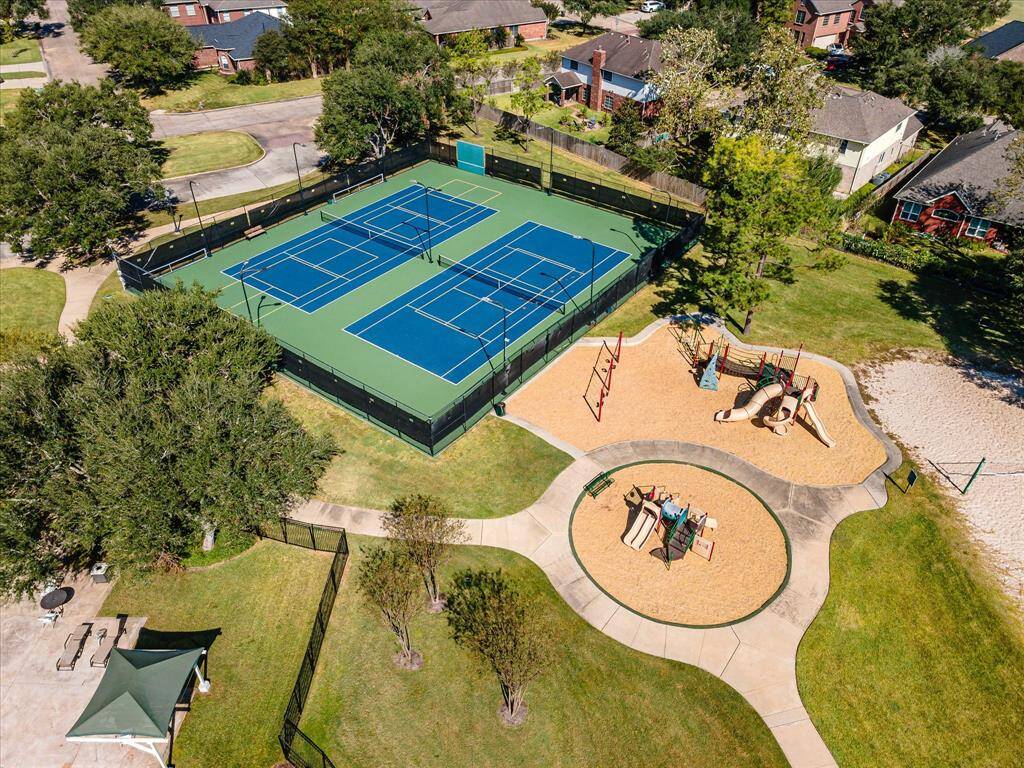 Key outside community amenities are all near by: pool, tennis courts, playgrounds, & volleyball court.