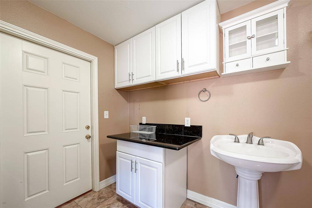 Laundry room inside the unit
