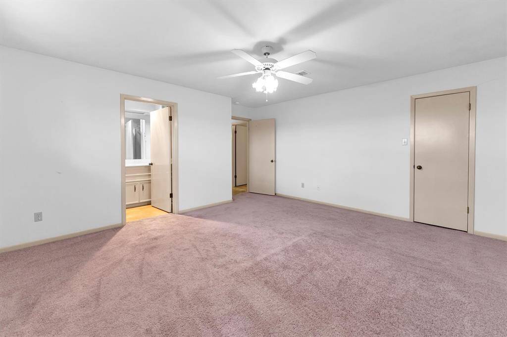 Primary bedroom with in suite bathroom.