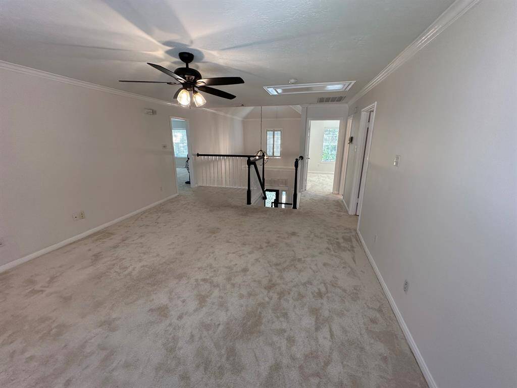 Upstairs gameroom/office area.