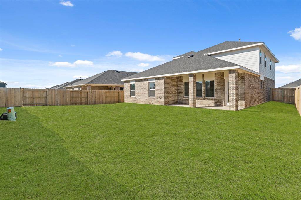 Huge Back Yard Space with Sprinkler System!