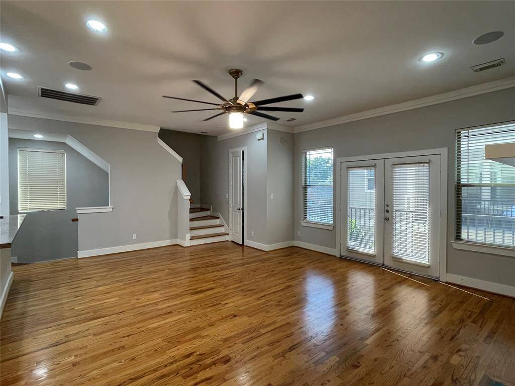 Second floor living area with balcony