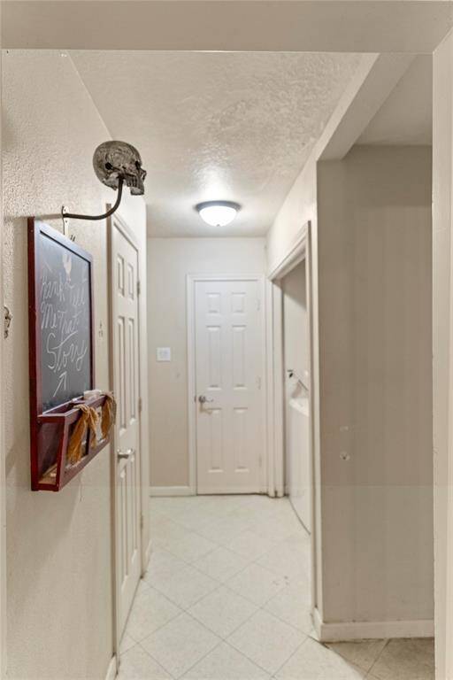 Laundry Area with half bath & Storage Closet