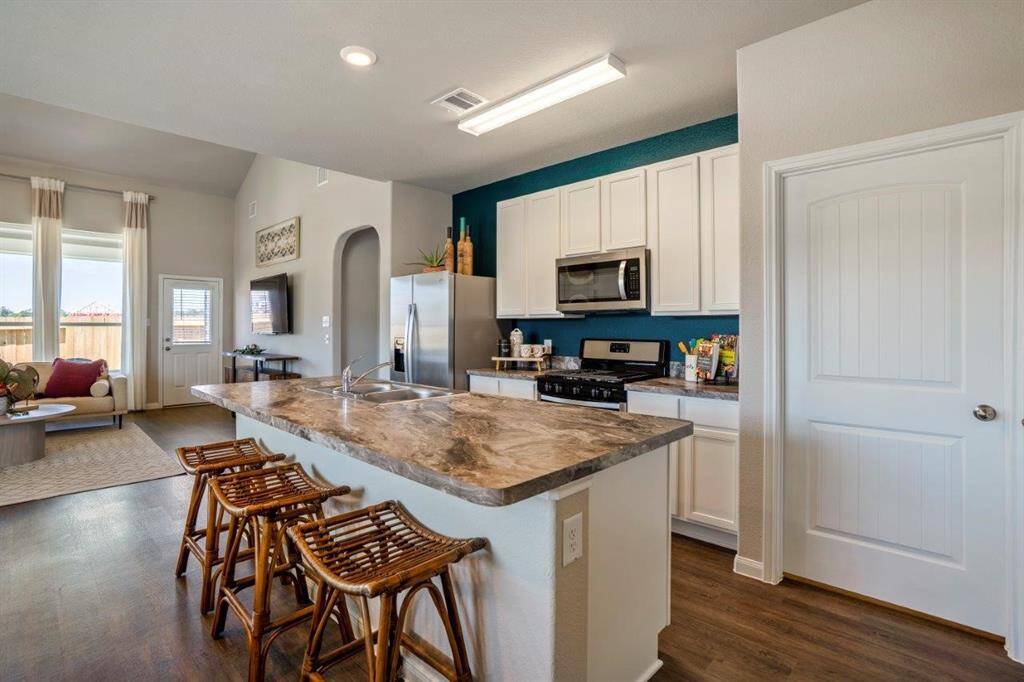 Photos are a representation of the floor plan. Options and interior selections will vary.