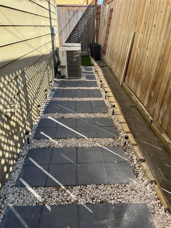 This unit is on the corner so has side yard as well.
