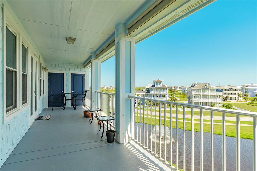 Large balcony with 2 additional storage units.