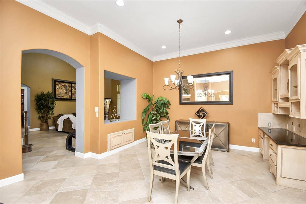 Spacious breakfast nook by kitchen.