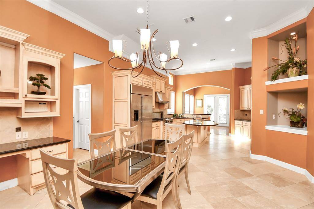 Spacious breakfast nook by kitchen.