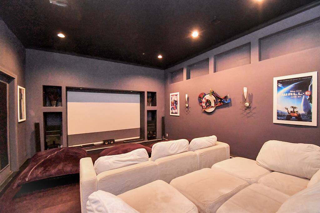 The heart of the home is all about hosting unforgettable gatherings. The first floor boasts a 15-seat media room perfect for movie nights, sporting events, or binge-watching your favorite shows. And with the entire house wired for audio and an intercom system throughout, you’ll never miss a beat whether you're in the media room, cooking in the kitchen, or working out in the gym.