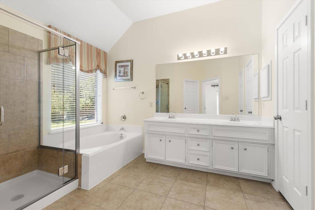 Oversized soaking tub and separate shower