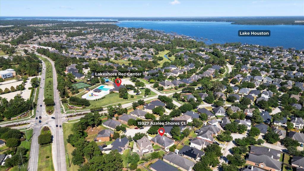 Aerial view of house, Lake Houston and West Lake Houston Pkway.