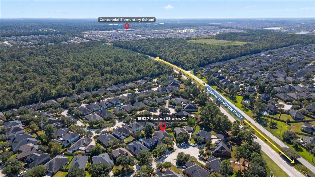 Aerial view of house and West Lake Houston Pkwy
