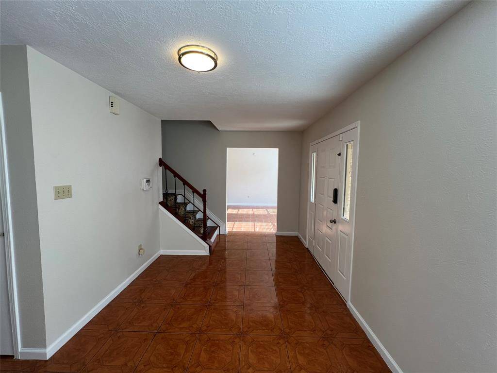 Entryway leading to the main living room