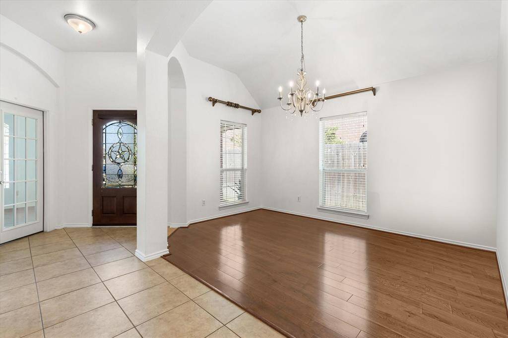 Formal Dining room space with ample natural light.